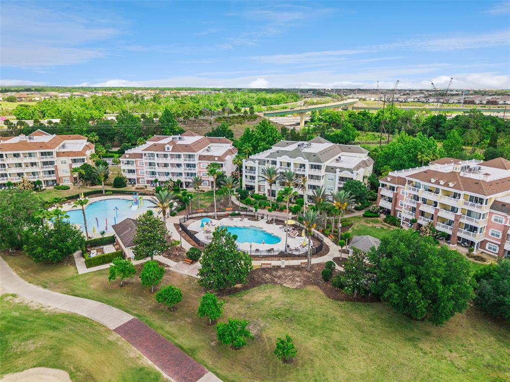 7602 Sandy Ridge Drive, Unit 103 Reunion, FL 34747 - Photo 40 of 61 a view of a city & street view