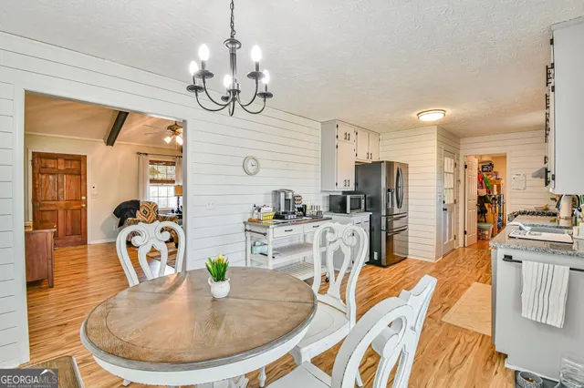 a view of a dining room with furniture