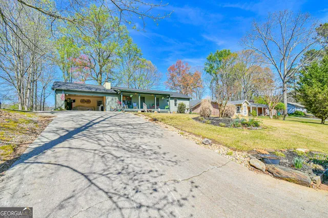 a house with trees in front of it