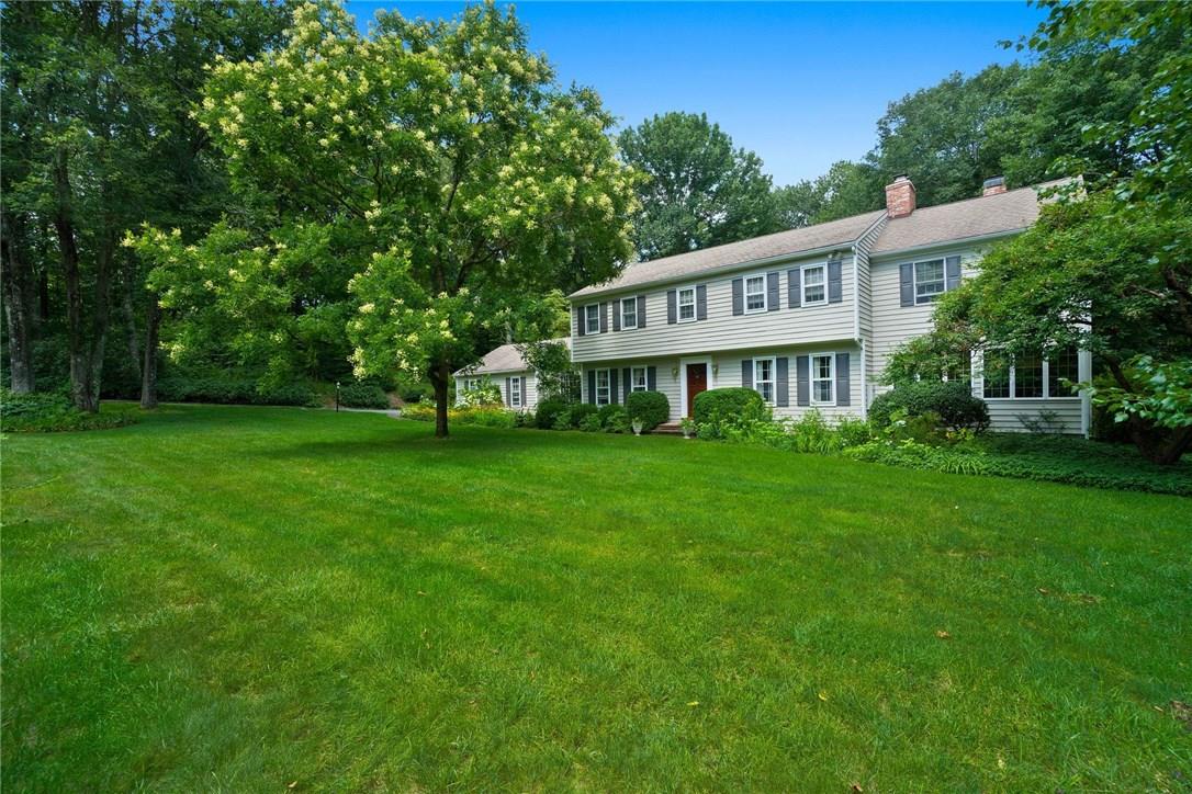 31 Fox Run Road Pound Ridge, NY 10576 - Photo 1 of 1 a view of an house with backyard and a tree