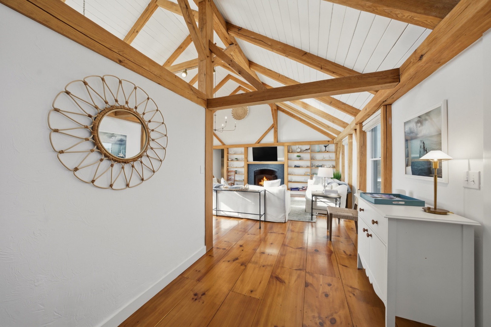 45 Sheep Pond Road Nantucket, MA 02554 - Photo 15 of 39 a view of a dining room with furniture wooden floor and a rug