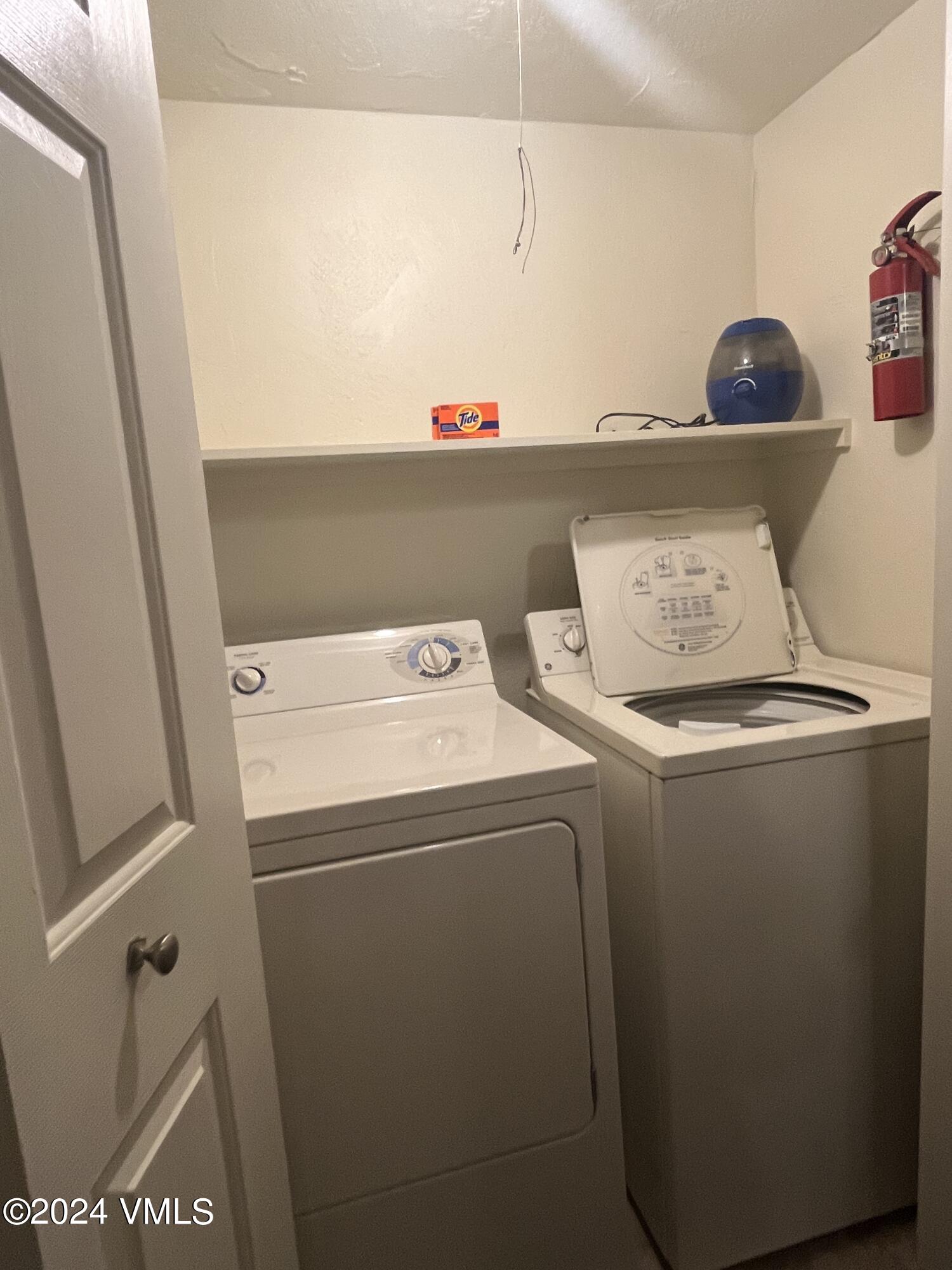 1020 Vail View Drive, Unit 330929 Vail, CO 81657 - Photo 6 of 21 a utility room with dryer and washer