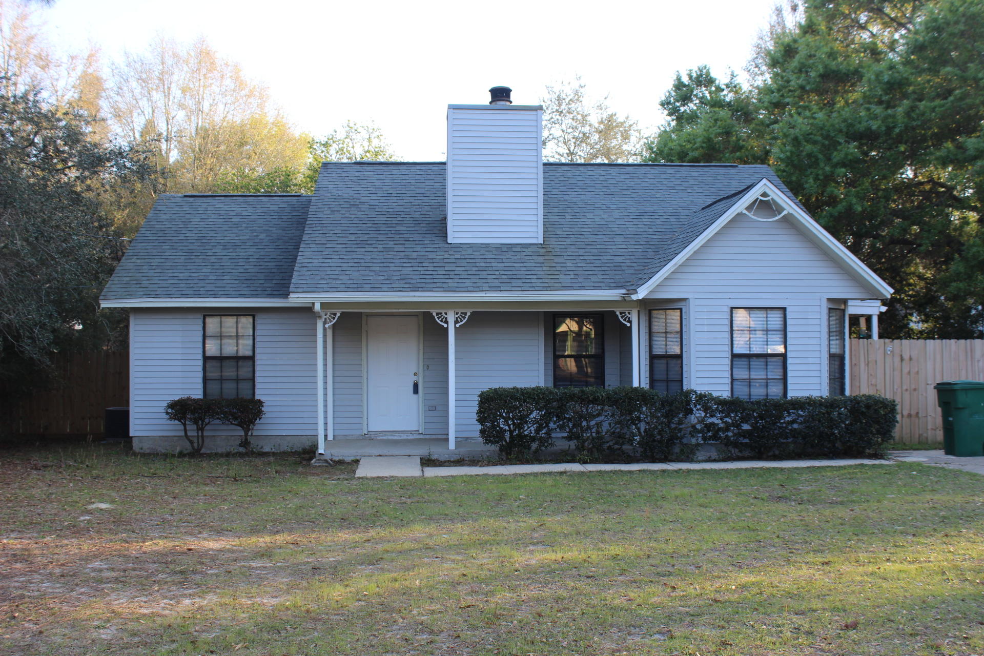 315 John King Road Crestview, FL 32539 - Photo 1 of 12 a front view of a house with a yard
