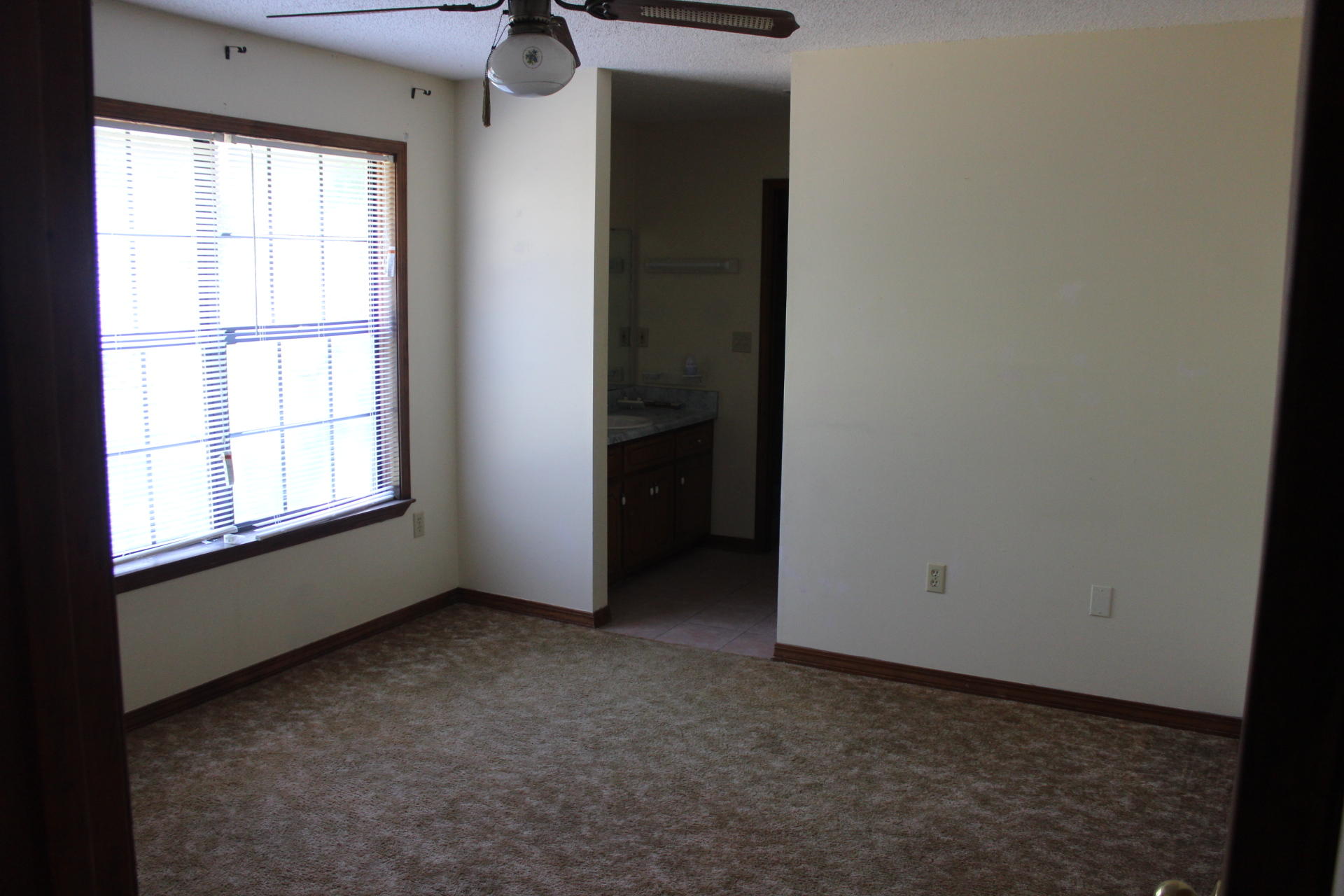 315 John King Road Crestview, FL 32539 - Photo 11 of 12 an empty room with windows