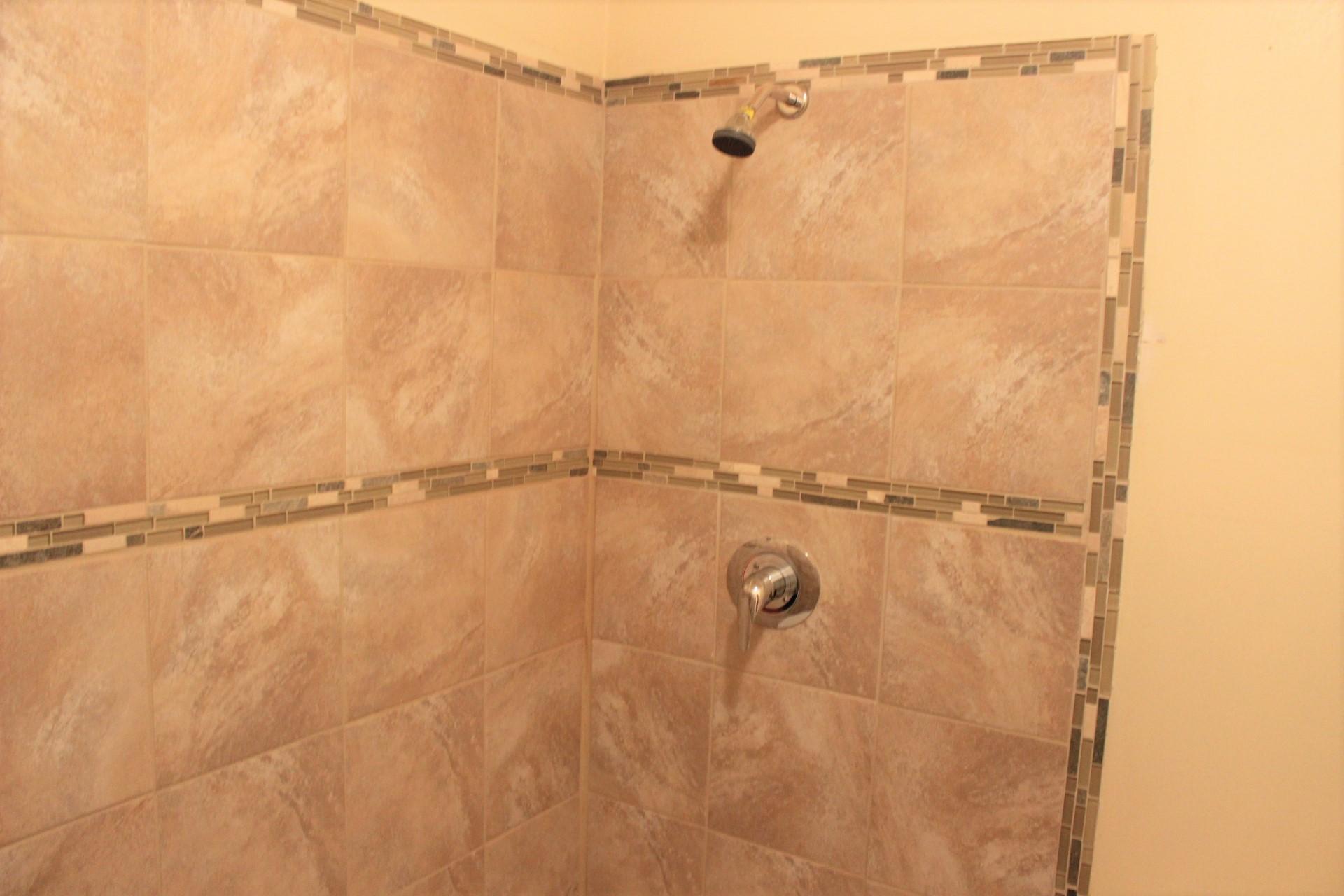 315 John King Road Crestview, FL 32539 - Photo 12 of 12 a bathroom with a shower and a shower