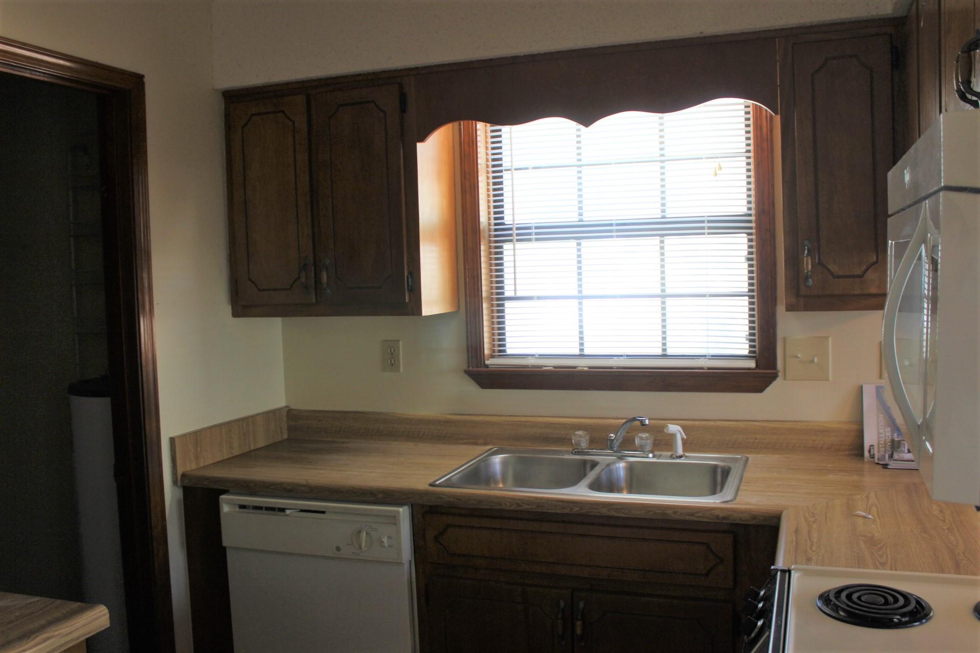 315 John King Road Crestview, FL 32539 - Photo 4 of 12 a bathroom with a sink and a window
