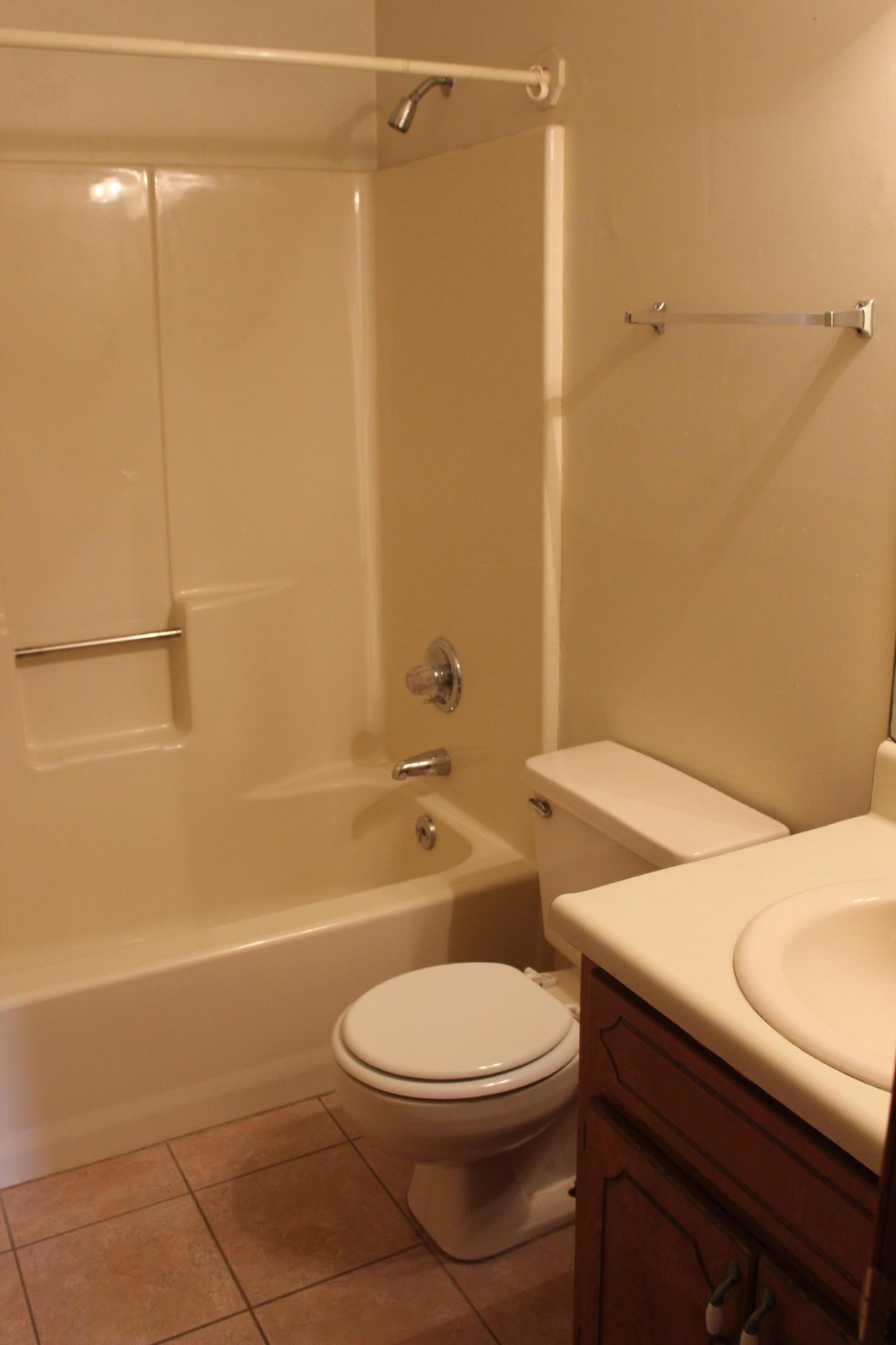 315 John King Road Crestview, FL 32539 - Photo 7 of 12 a bathroom with a toilet a sink and shower
