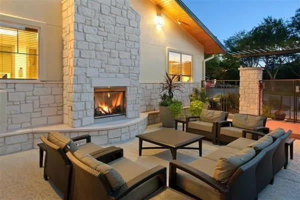 a outdoor living space with furniture and a potted plant