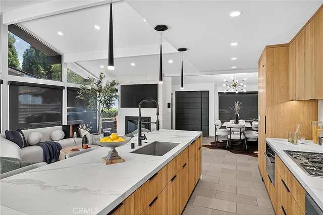 a view of a dining room with furniture and window