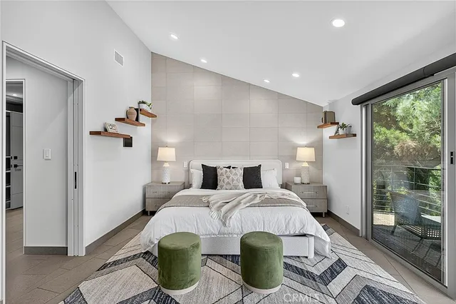 a bathroom with a tub and a shower