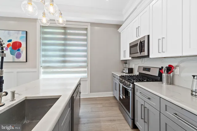 a bedroom with a bed and a table in it