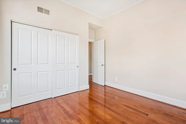 a kitchen with stainless steel appliances granite countertop a refrigerator stove top oven and sink