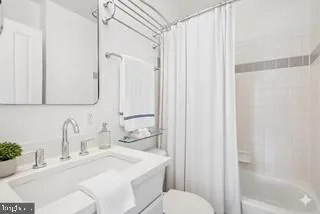 a view of a roof deck with dining table and chairs with wooden floor