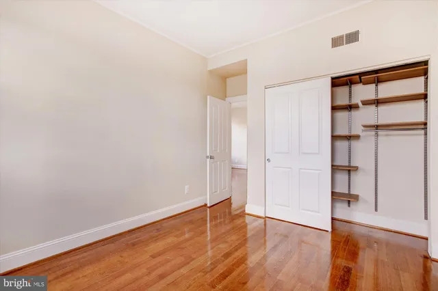 a view of roof deck with seating space and barbeque oven