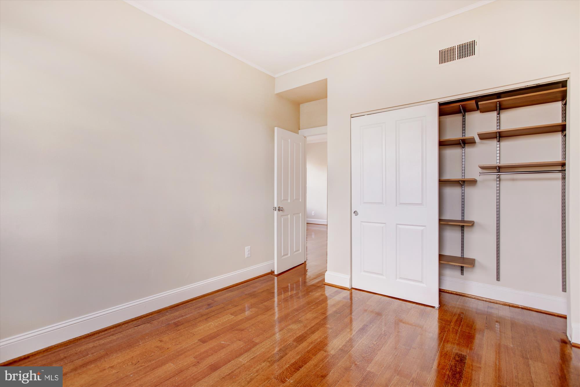 2008 16th Street Northwest, Unit 402 Washington, DC 20009 - Photo 17 of 34 wooden floor in an empty room