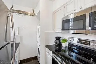 a black and white photo of a street