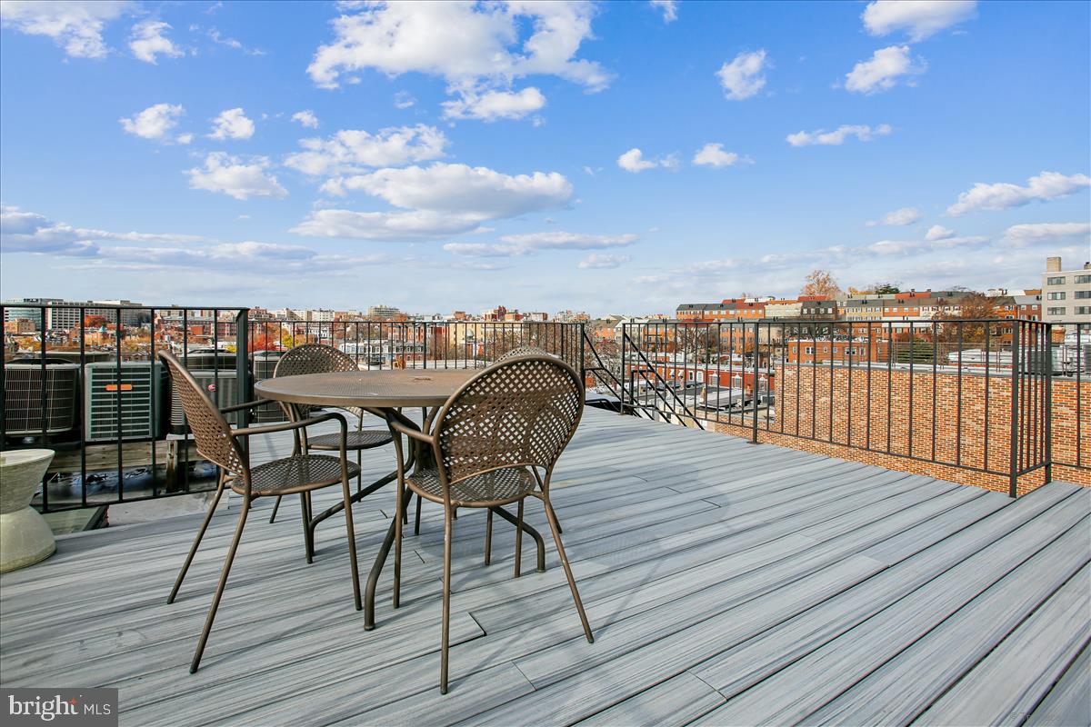 2008 16th Street Northwest, Unit 402 Washington, DC 20009 - Photo 25 of 34 a view of a roof deck with patio