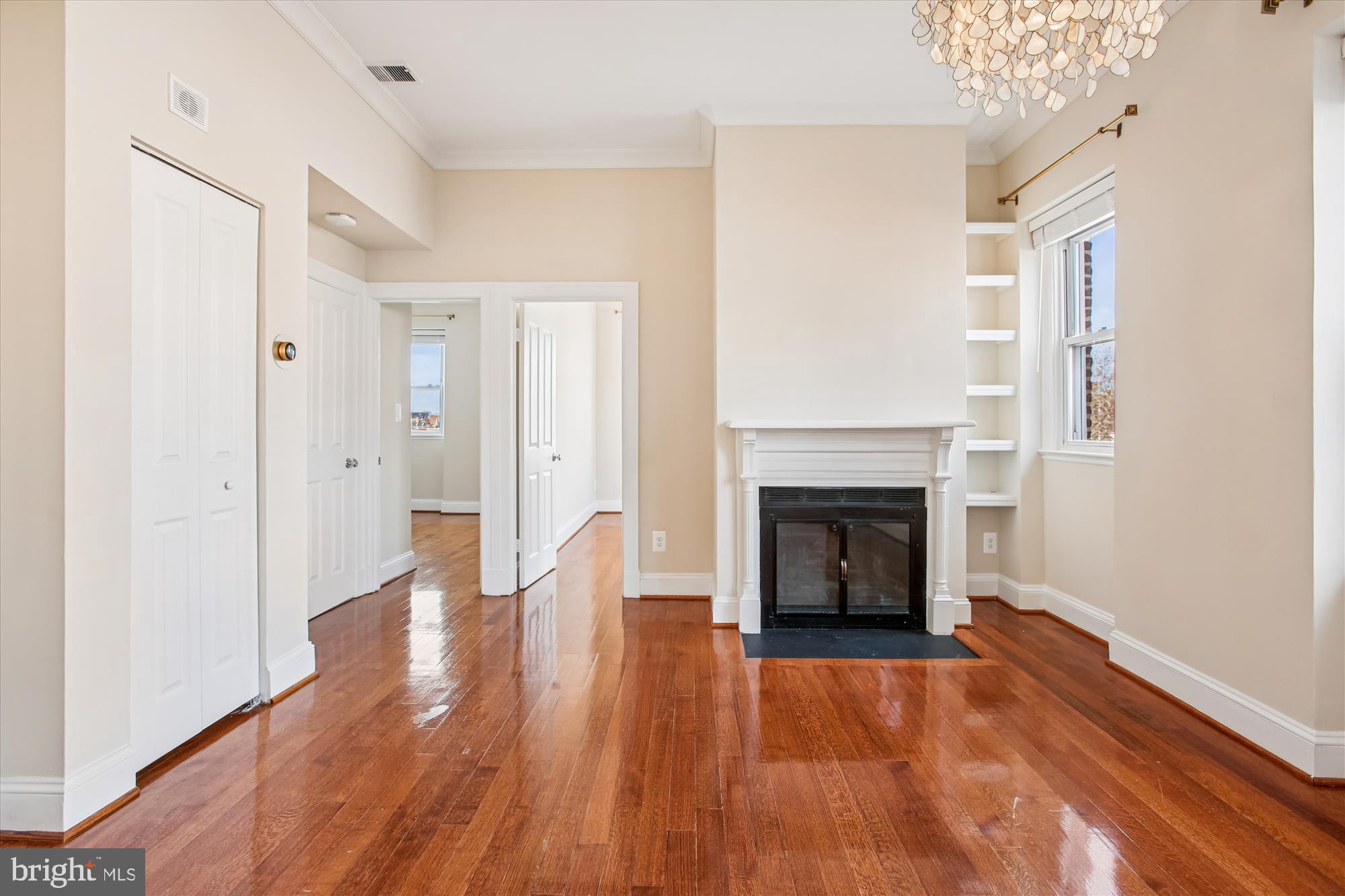 2008 16th Street Northwest, Unit 402 Washington, DC 20009 - Photo 4 of 34 a view of a livingroom with wooden floor and a fireplace