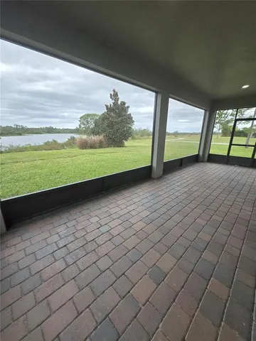 a view of an house with backyard space and garden