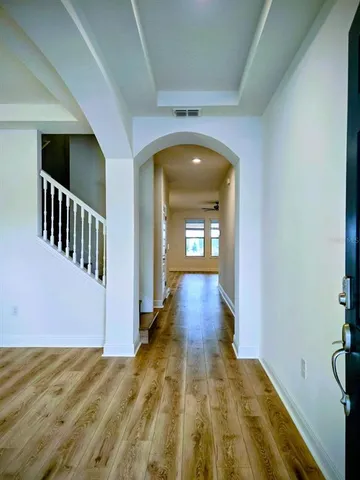a view of livingroom with wooden floor