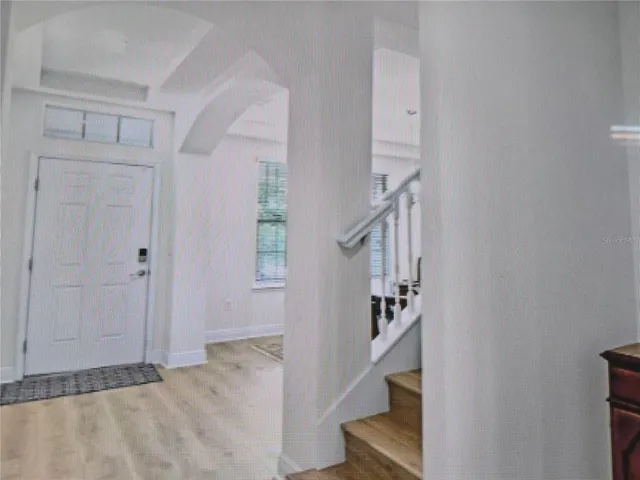 a view of an entryway with staircase