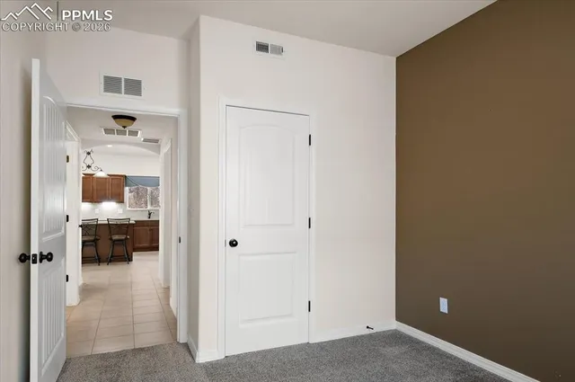 a view of a bedroom with a wardrobe space