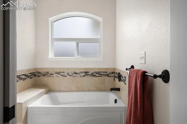a bathroom with a bathtub