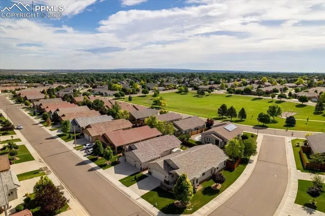 an aerial view of residential building with outdoor space