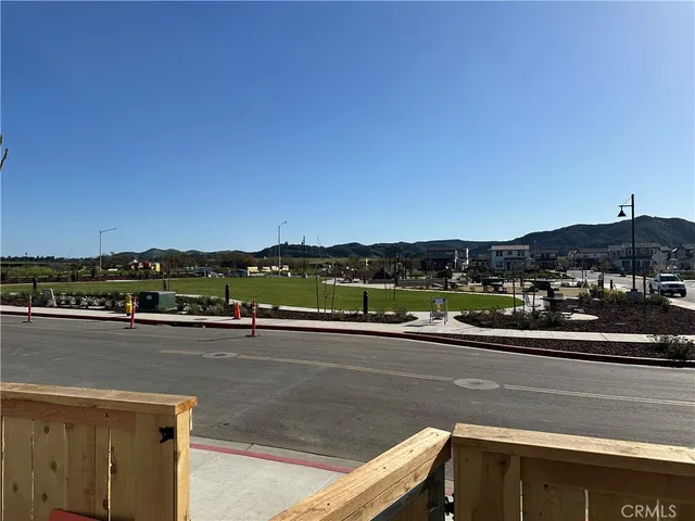 a view of swimming pool with outdoor seating