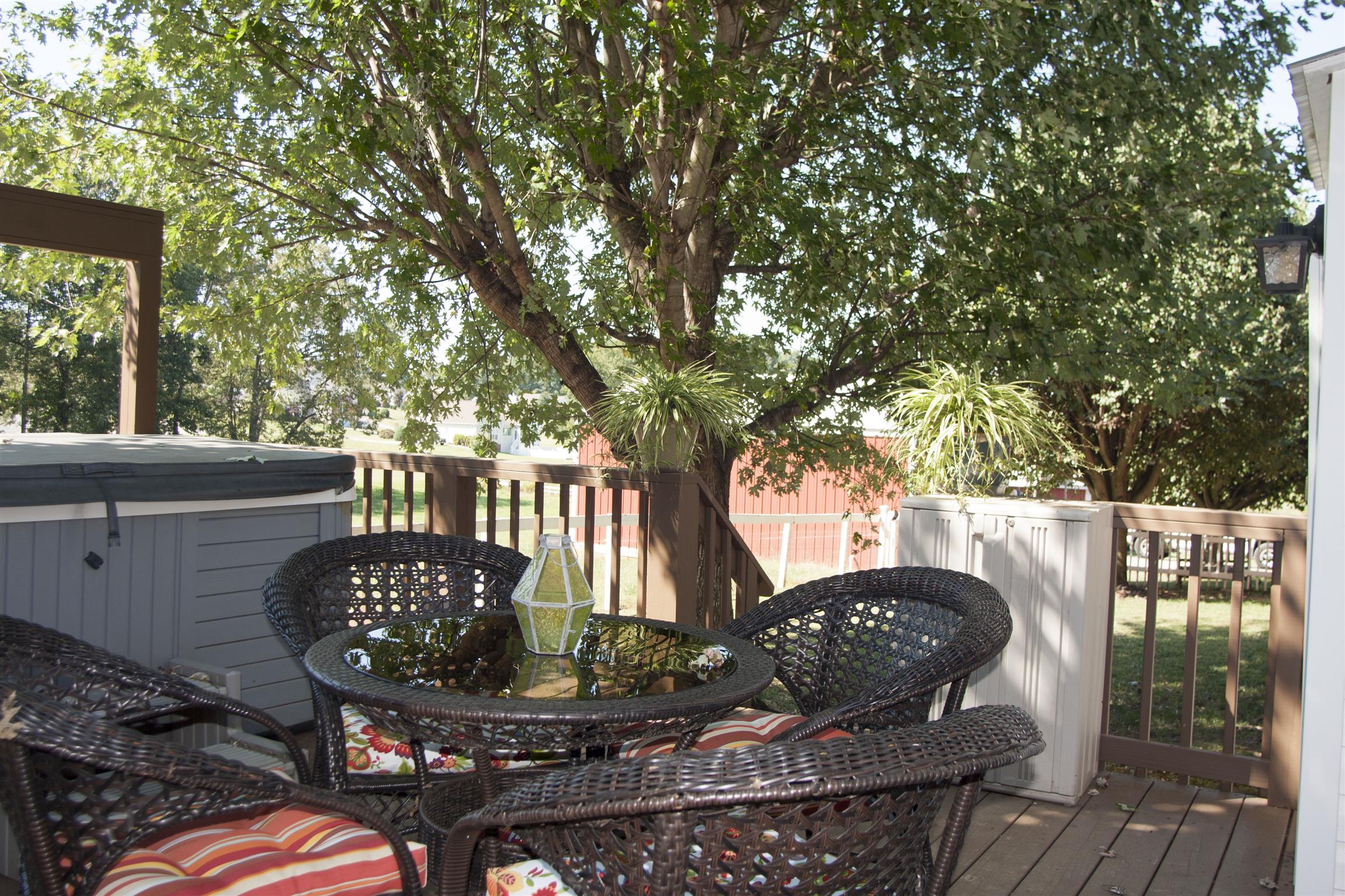984 Dixie Bee Road Adams, TN 37010 - Photo 13 of 18 a view of a chairs and table in the patio
