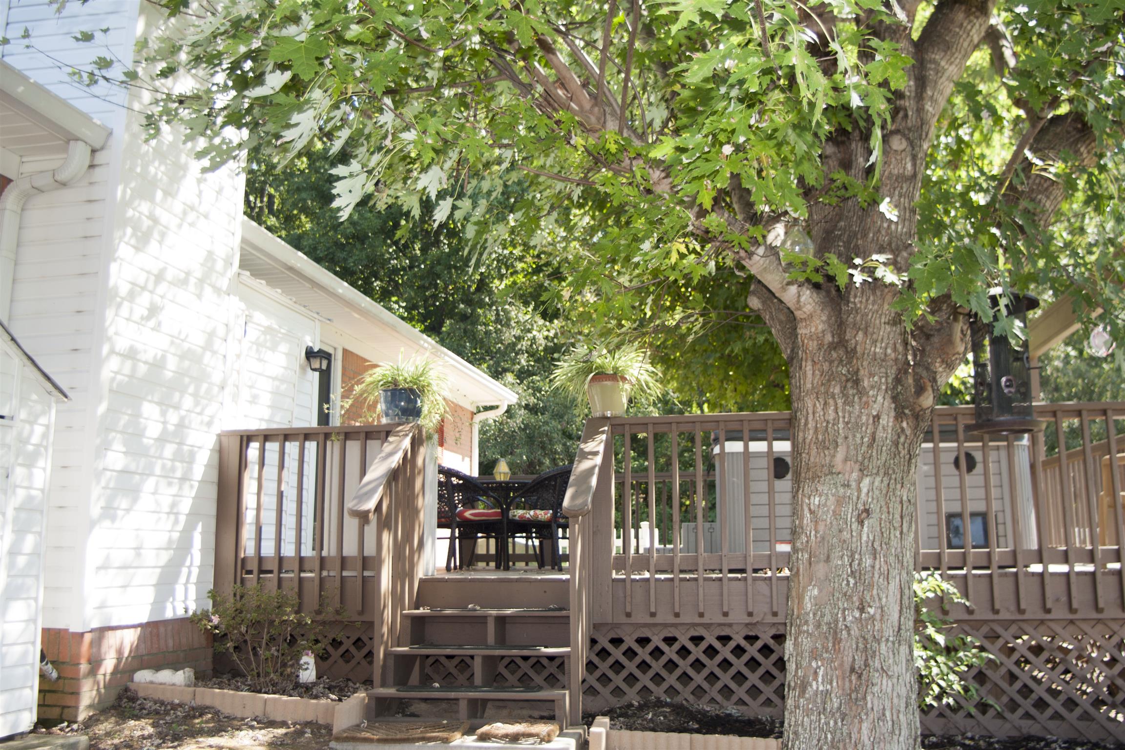 984 Dixie Bee Road Adams, TN 37010 - Photo 14 of 18 a view of a house with a tree
