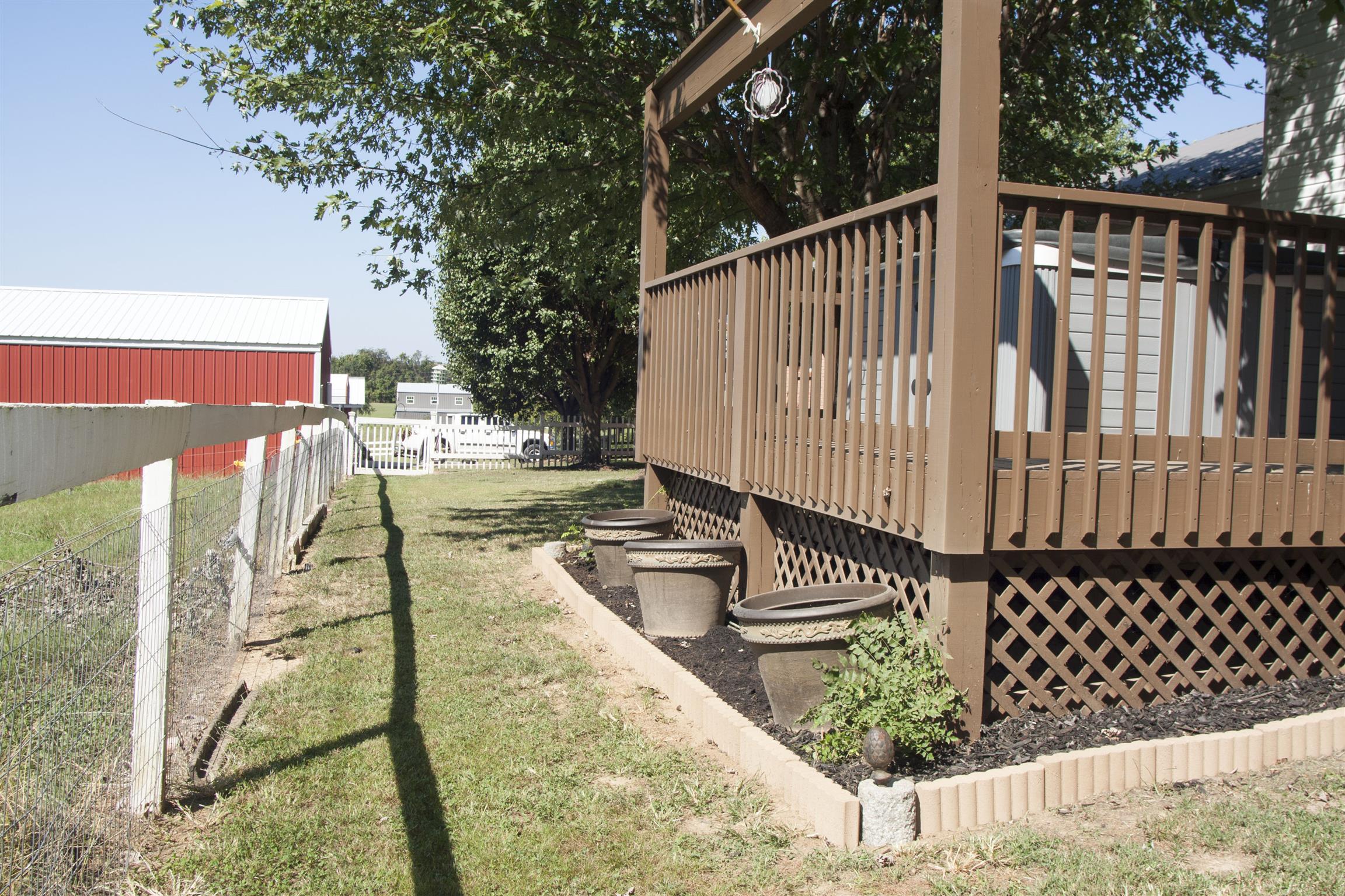 984 Dixie Bee Road Adams, TN 37010 - Photo 15 of 18 a view of a chair and tables