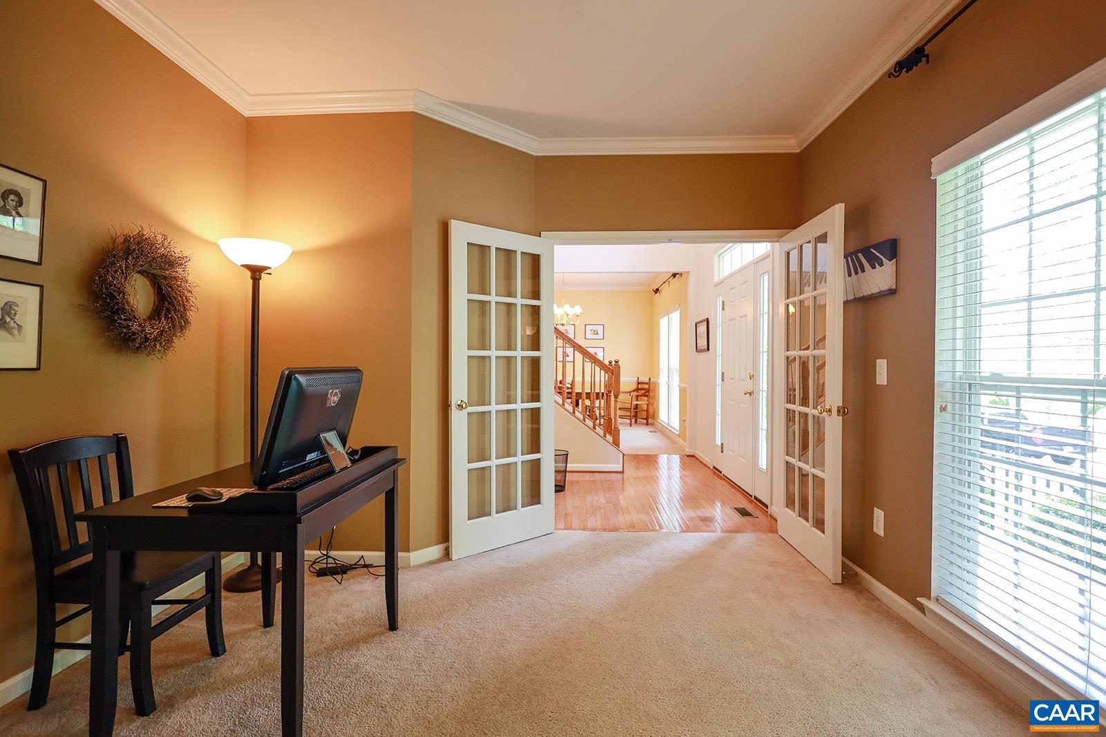 5372 Park Road Crozet, VA 22932 - Photo 20 of 54 a view of a workspace with furniture and a window