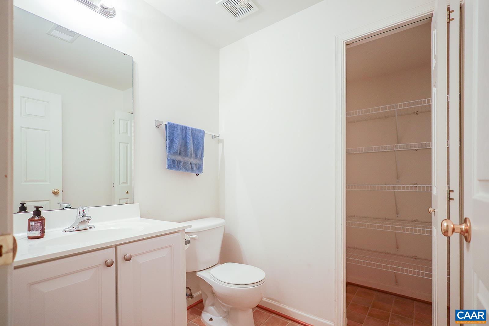 5372 Park Road Crozet, VA 22932 - Photo 50 of 54 a bathroom with a sink a toilet and a mirror