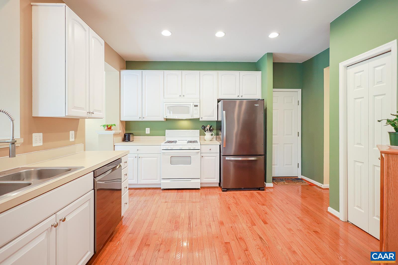 5372 Park Road Crozet, VA 22932 - Photo 8 of 54 a kitchen with a refrigerator sink and cabinets