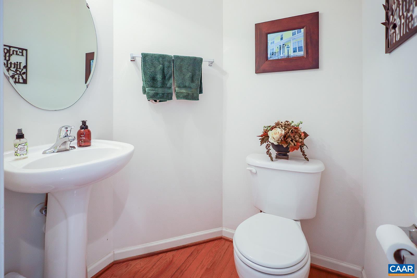 5372 Park Road Crozet, VA 22932 - Photo 10 of 54 a white toilet sitting next to a bathroom sink