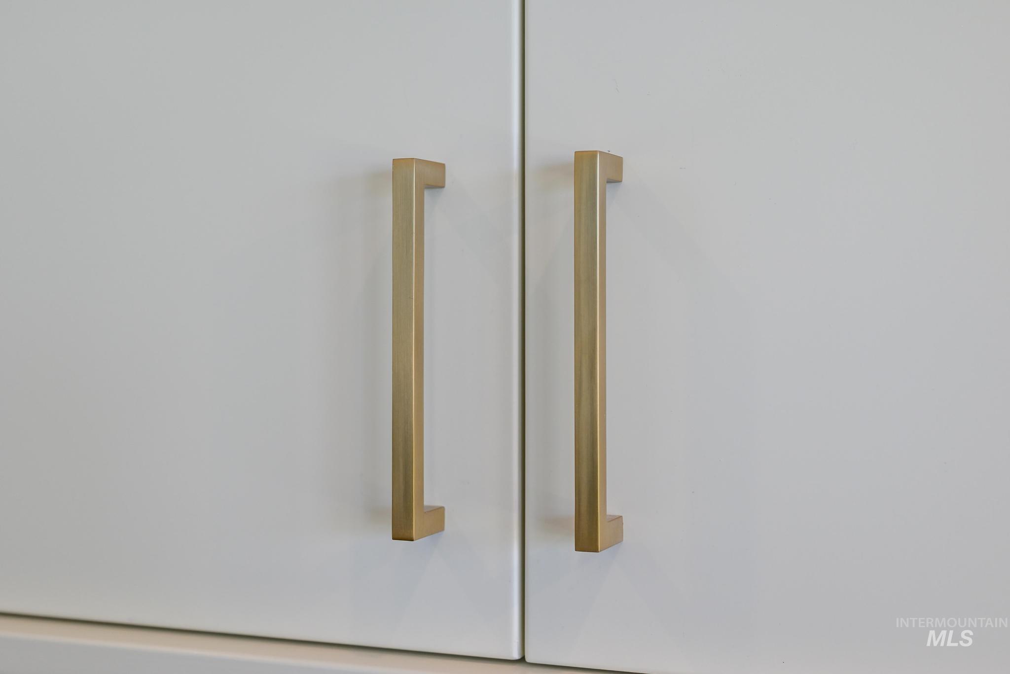 14703 Serenity Pt Street Caldwell, ID 83607 - Photo 16 of 45 Flat-panel cabinetry with brushed brass hardware