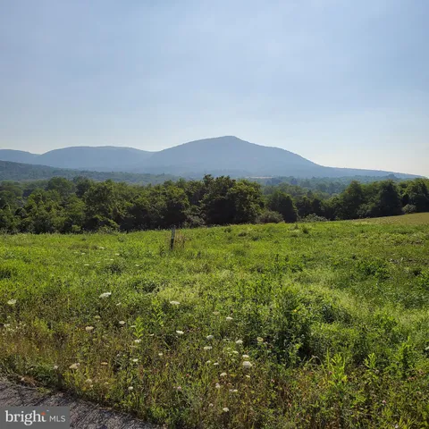 a view of an outdoor space and a mountain view