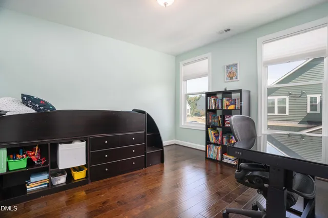 a aerial view of a house with swimming pool