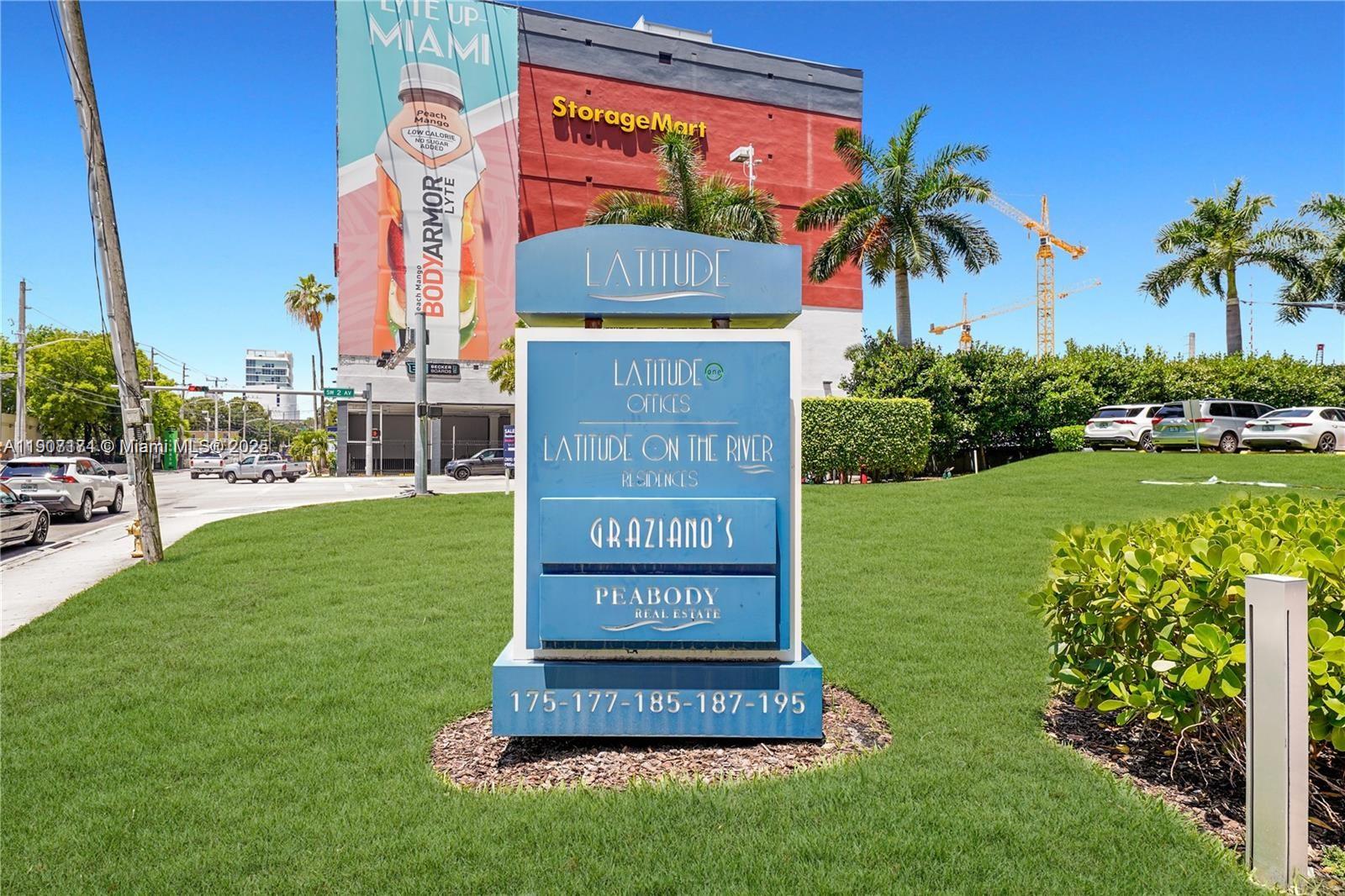 185 Southwest 7th Street, Unit 3100 Miami, FL 33130 - Photo 2 of 19 a sign on the side of the building