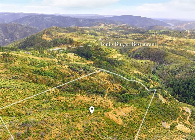 a view of an aerial view of residential houses with outdoor space
