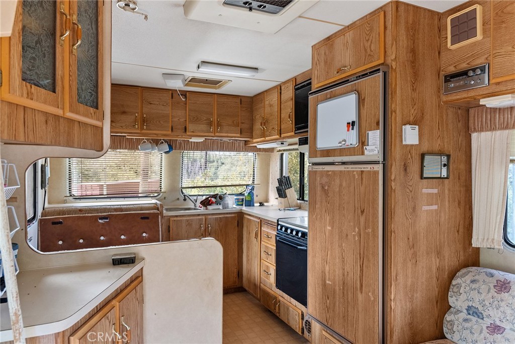 0 Deadwood Road Oroville, CA 95965 - Photo 28 of 55 a kitchen with refrigerator and window
