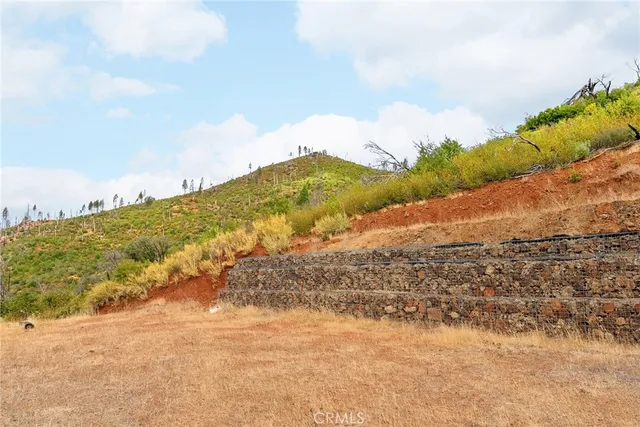 a view of lake with green space