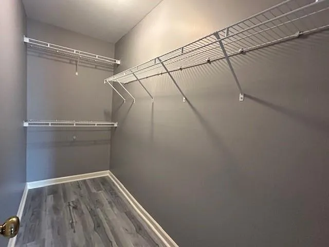 a kitchen with stainless steel appliances granite countertop a refrigerator sink and stove