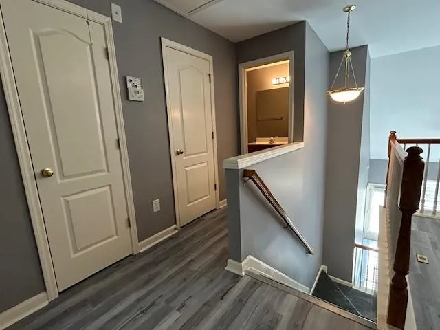 a kitchen with stainless steel appliances granite countertop a refrigerator a stove a sink and a granite counter tops