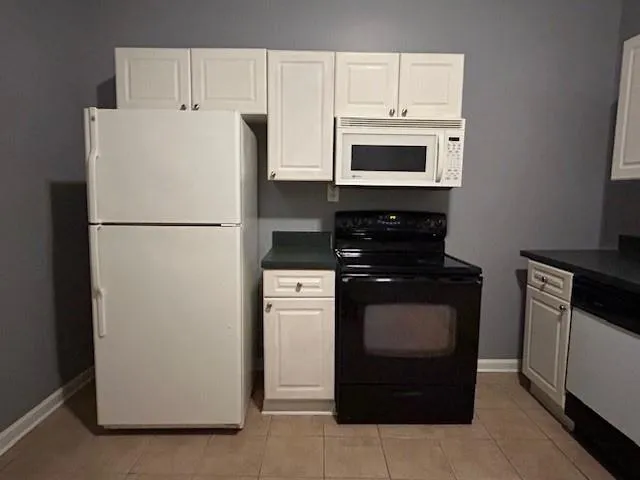 an empty room with wooden floor