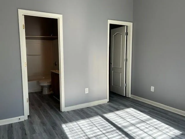 a view of a house with swimming pool and sitting area