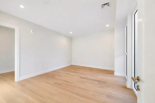 a bathroom with a sink a toilet and a shower