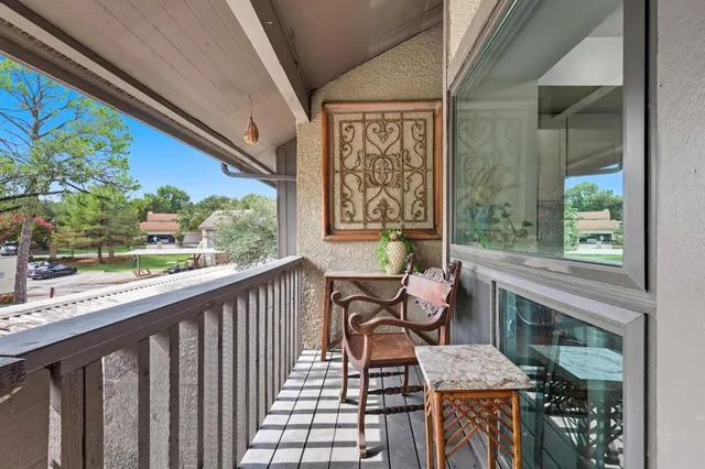 a balcony with with furniture and outdoor view