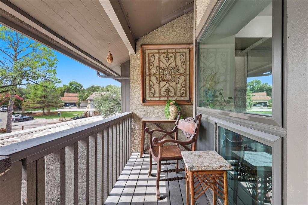 a balcony with with furniture and outdoor view